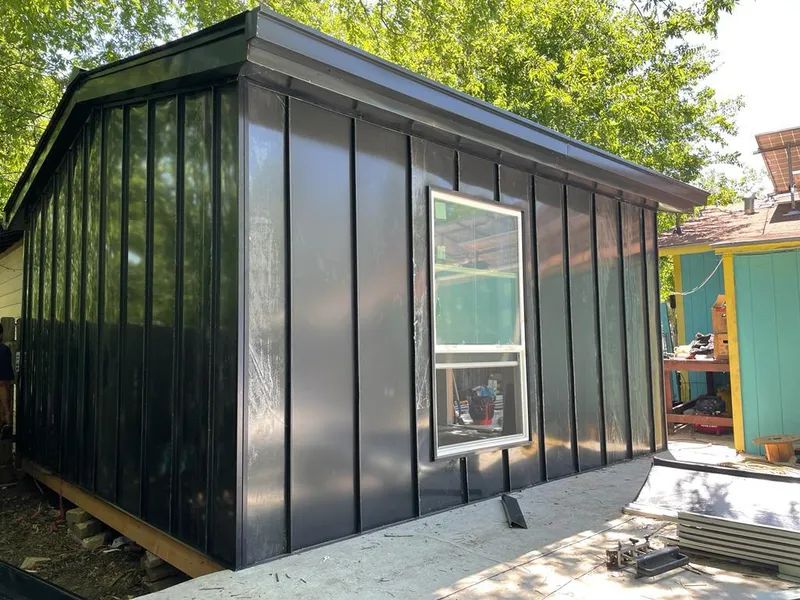 Black standing seam metal wall panels for Metal Roof Installation in North Decatur